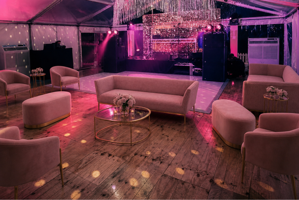 pink lounge furniture in a marquee for a disco theme party